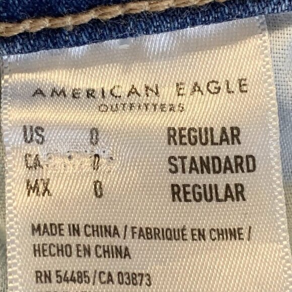 American Eagle Women's Strigid Ripped Distressed Mom Jean in Blown Out Blue SZ 0 - Picture 10 of 15